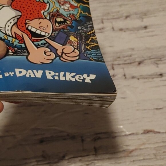 Captain Underpants and the Preposterous Plight of the Purple Potty People Book - Picture 2 of 5